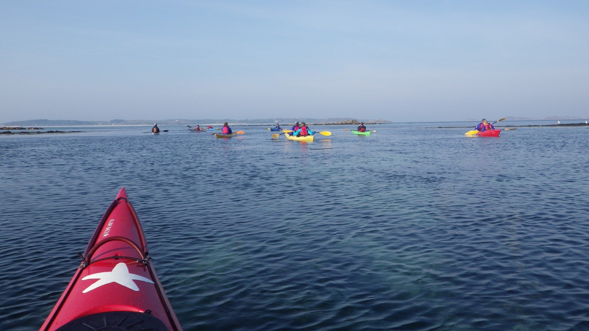 A group of kayakers off the Isle of Scilly