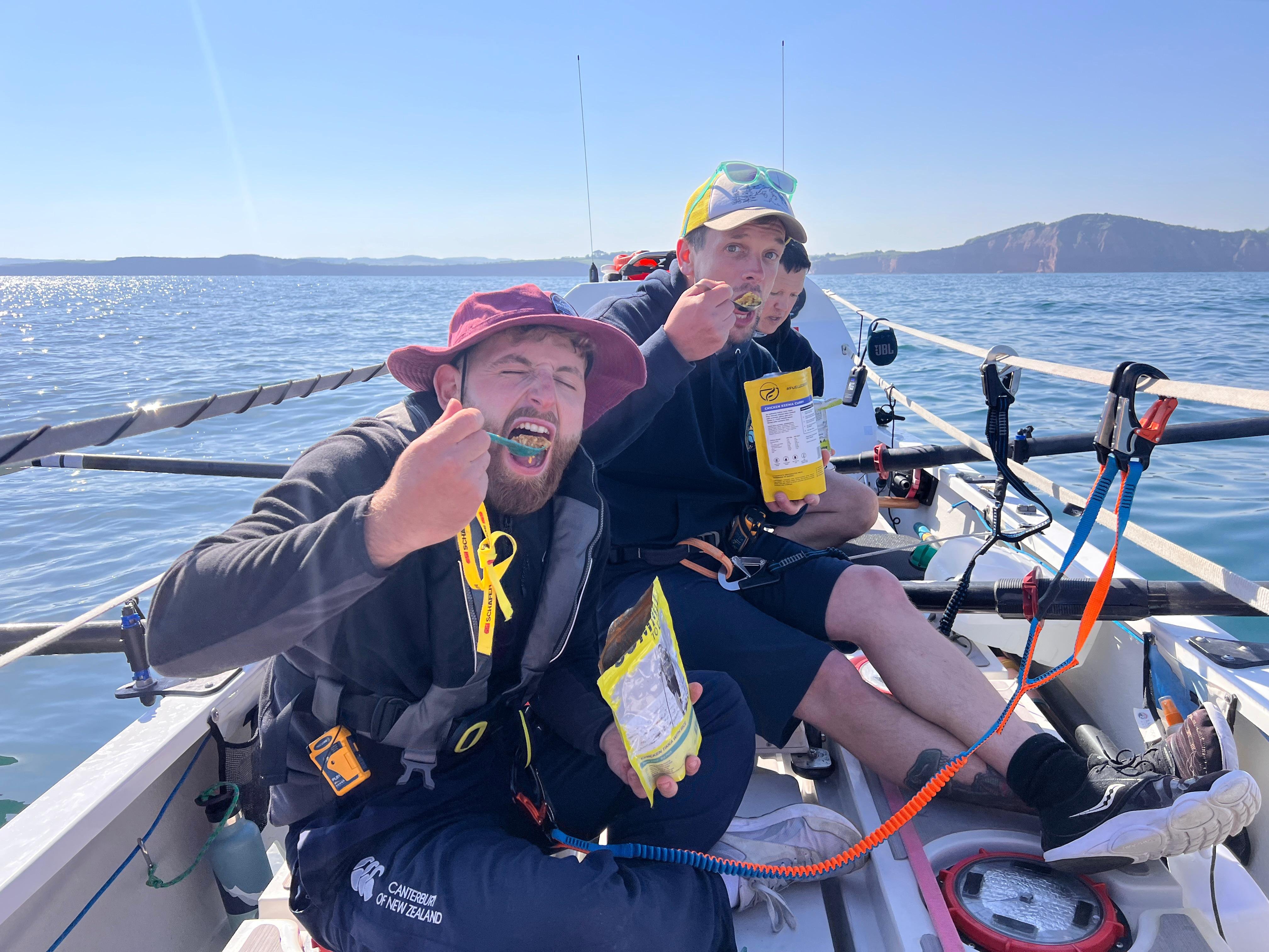 Rhys and Tom testing out the food they will be eating on the crossing.
