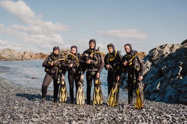 Dive Project Cornwall divers standing in a line