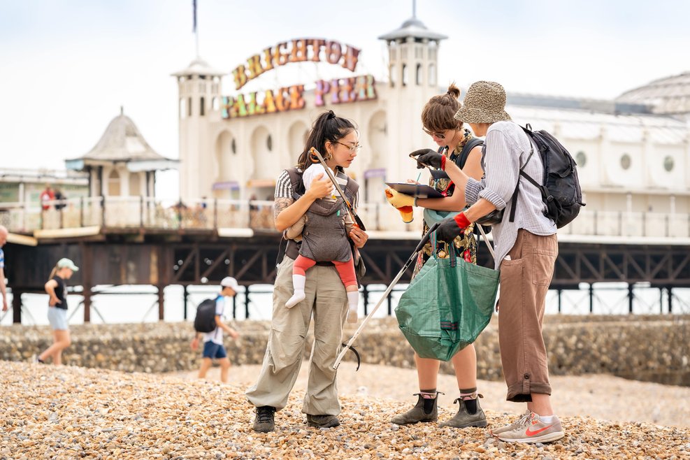 A group of volunteers taking part in the Great British Beach Clean at Brighton Beach
