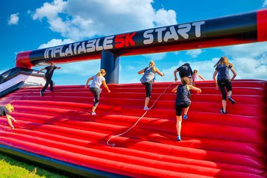 Participants at the inflatable 5K track