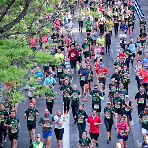 A large group of people participating in a marathon