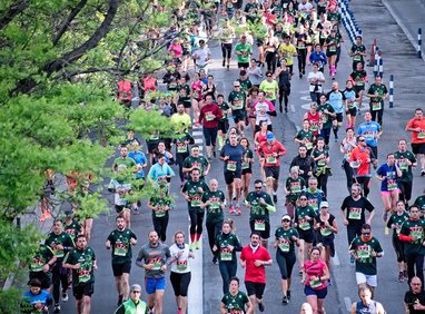 A large group of people participating in a marathon