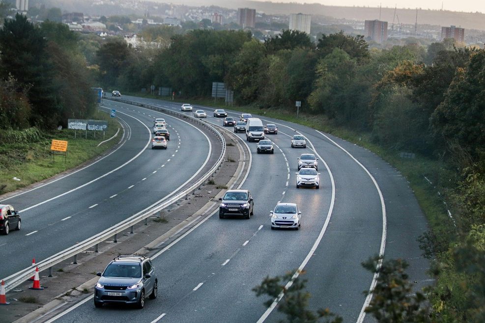 Cars are photographed on a motorway