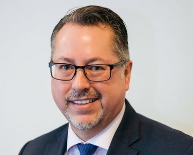 Will Oulton, the Marine Conservation Society's Vice-Chair, smiles at the camera in a portrait photograph