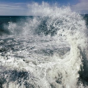 Waves crashing in open ocean.